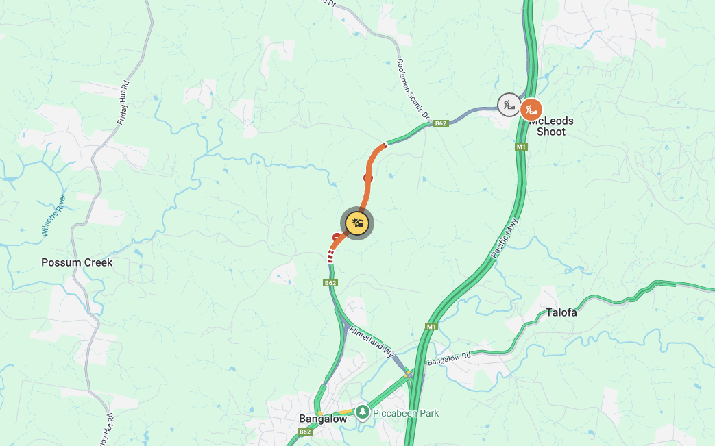 Hinterland Way closed in both directions after bus and car crash